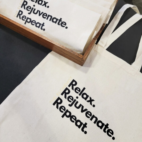 The Elchemist - Multiple Cotton Tote Bag Displayed - Relax. Rejuvenate. Repeat.